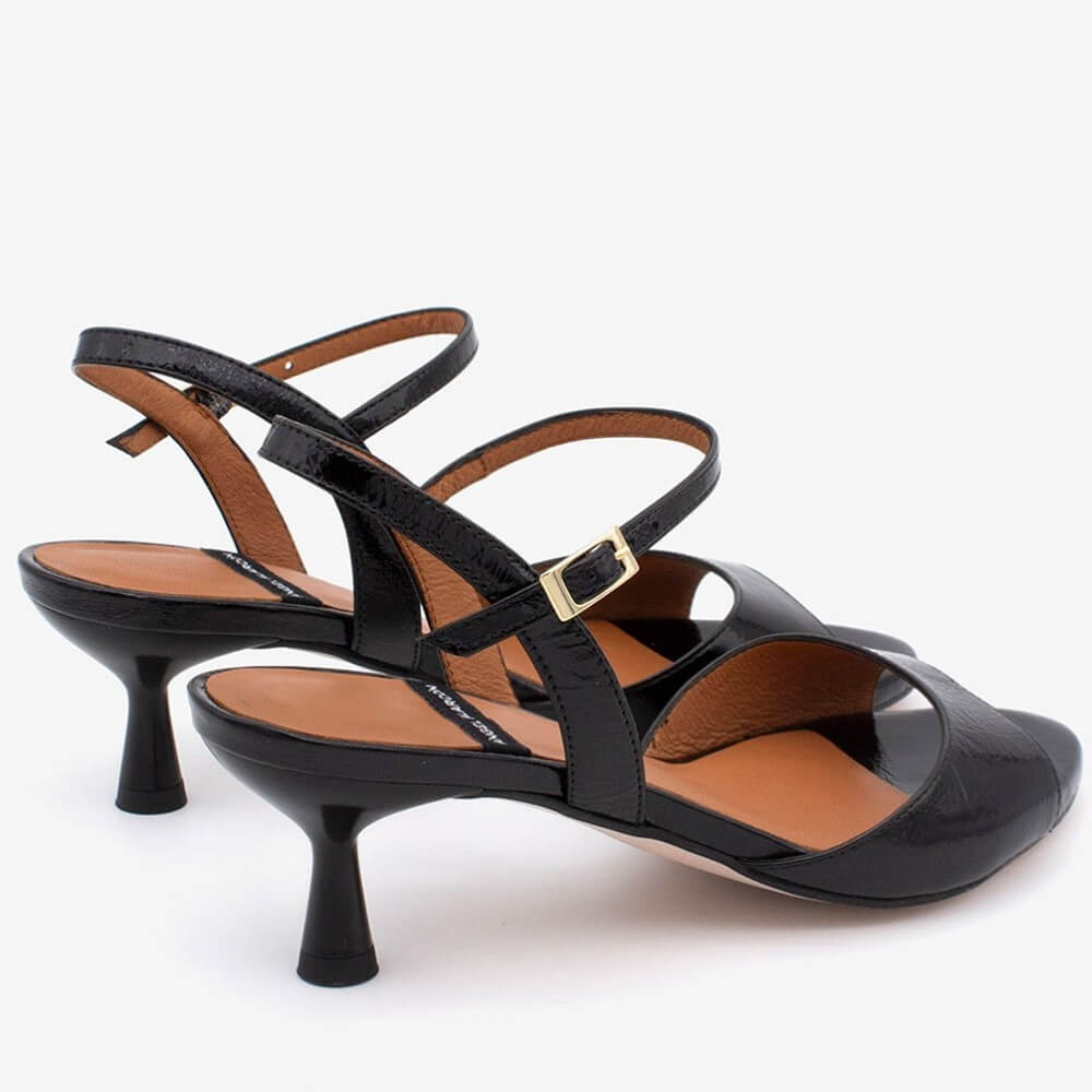 Angel Alacron Black high-heeled sandals with brown insoles on a white background