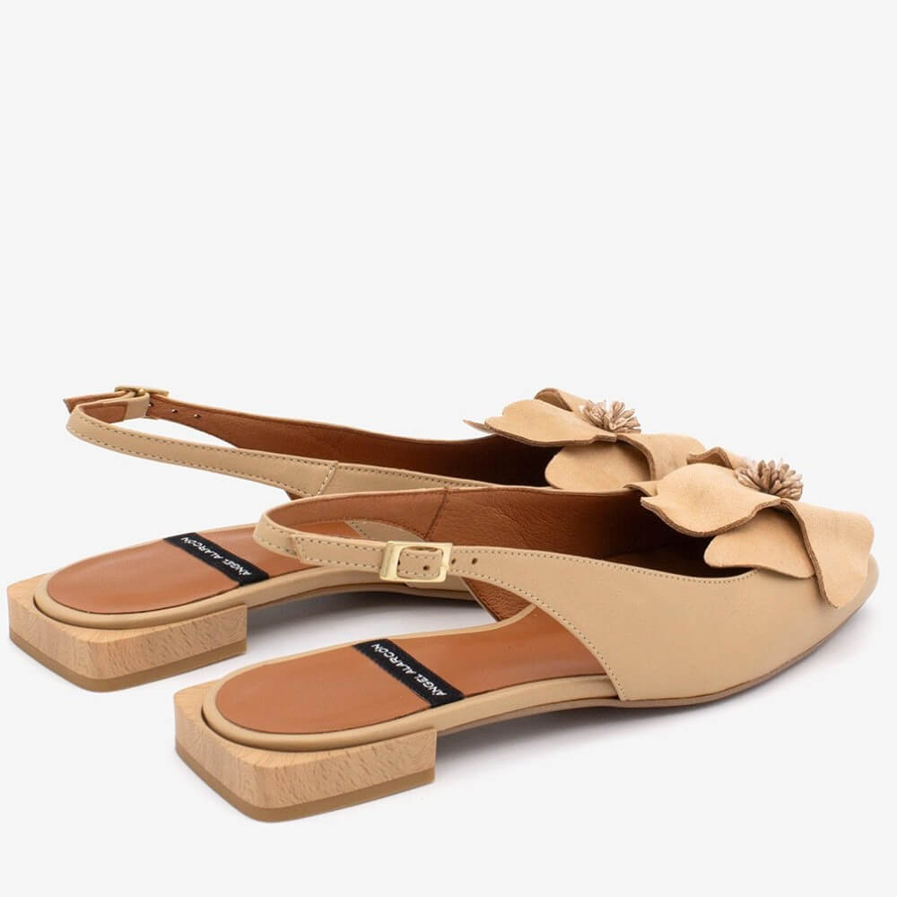 Angel Alarcon Beige sandals with floral decorations on a white background
