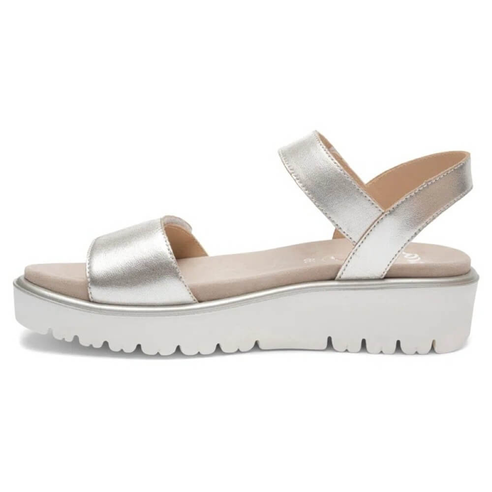 Ara Gold sandal with a platform sole on a white background