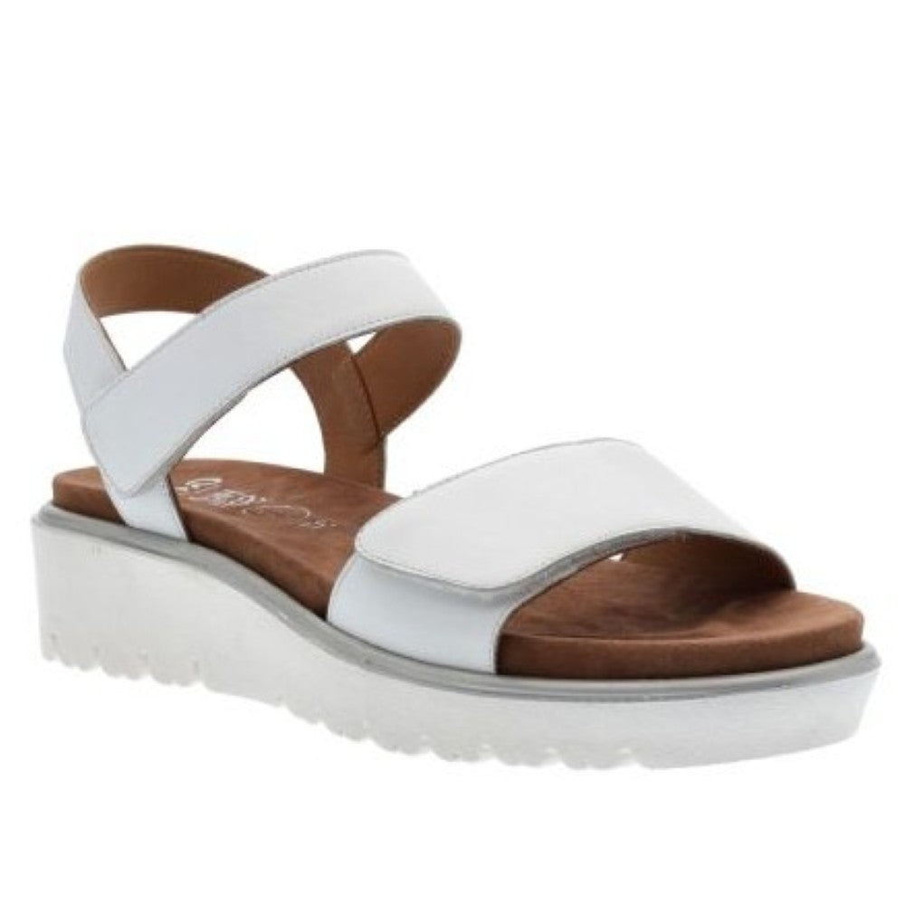 An ara white platform sandal with wide crossover Velcro straps and a brown footbed, shown from a side profile on a white background.