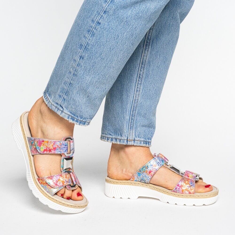 ara Multicolored sandals worn with light blue jeans on a white background
