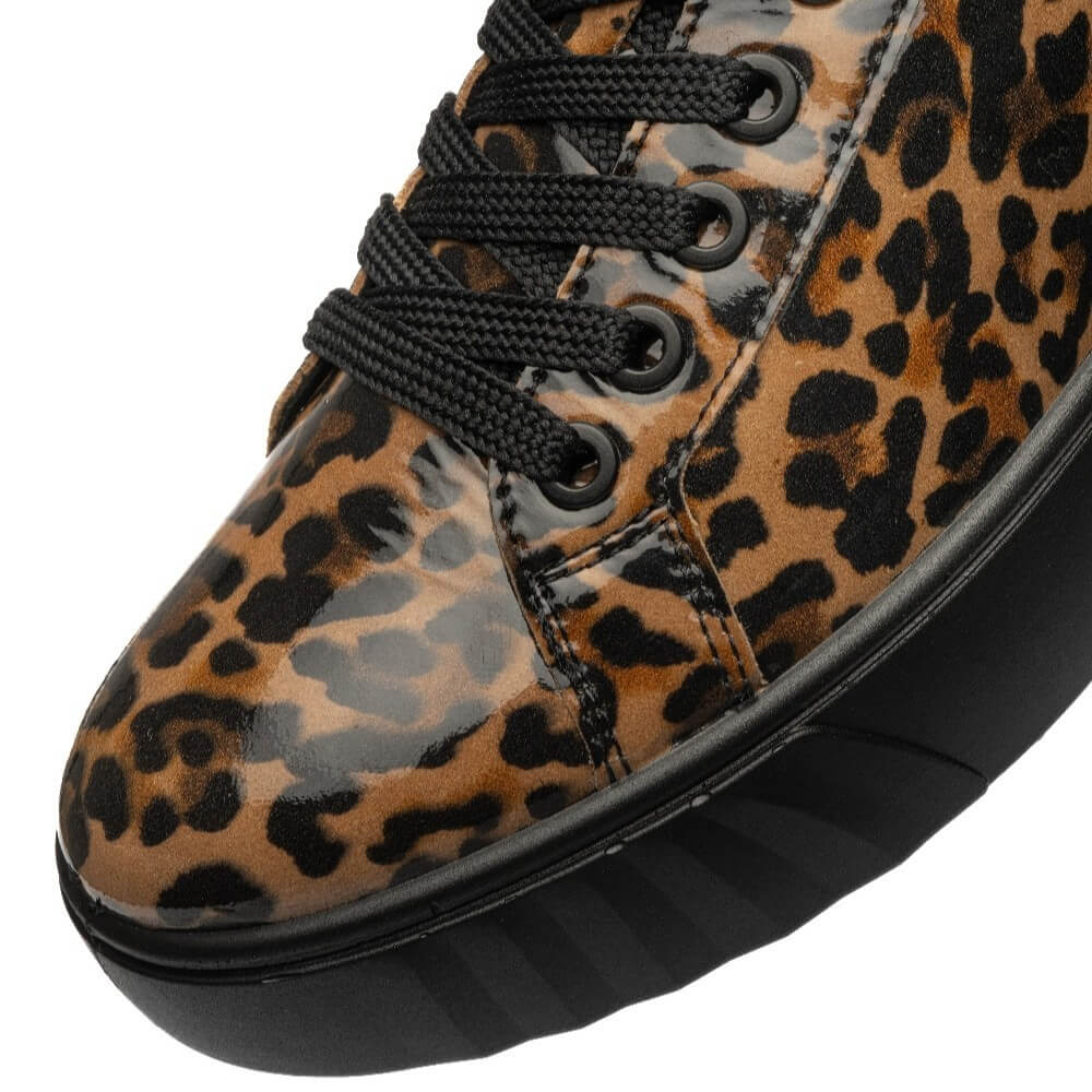  Ara low-top platform sneaker featuring a brown and black leopard print upper with black laces and thick black platform soles, shown against a plain white background.