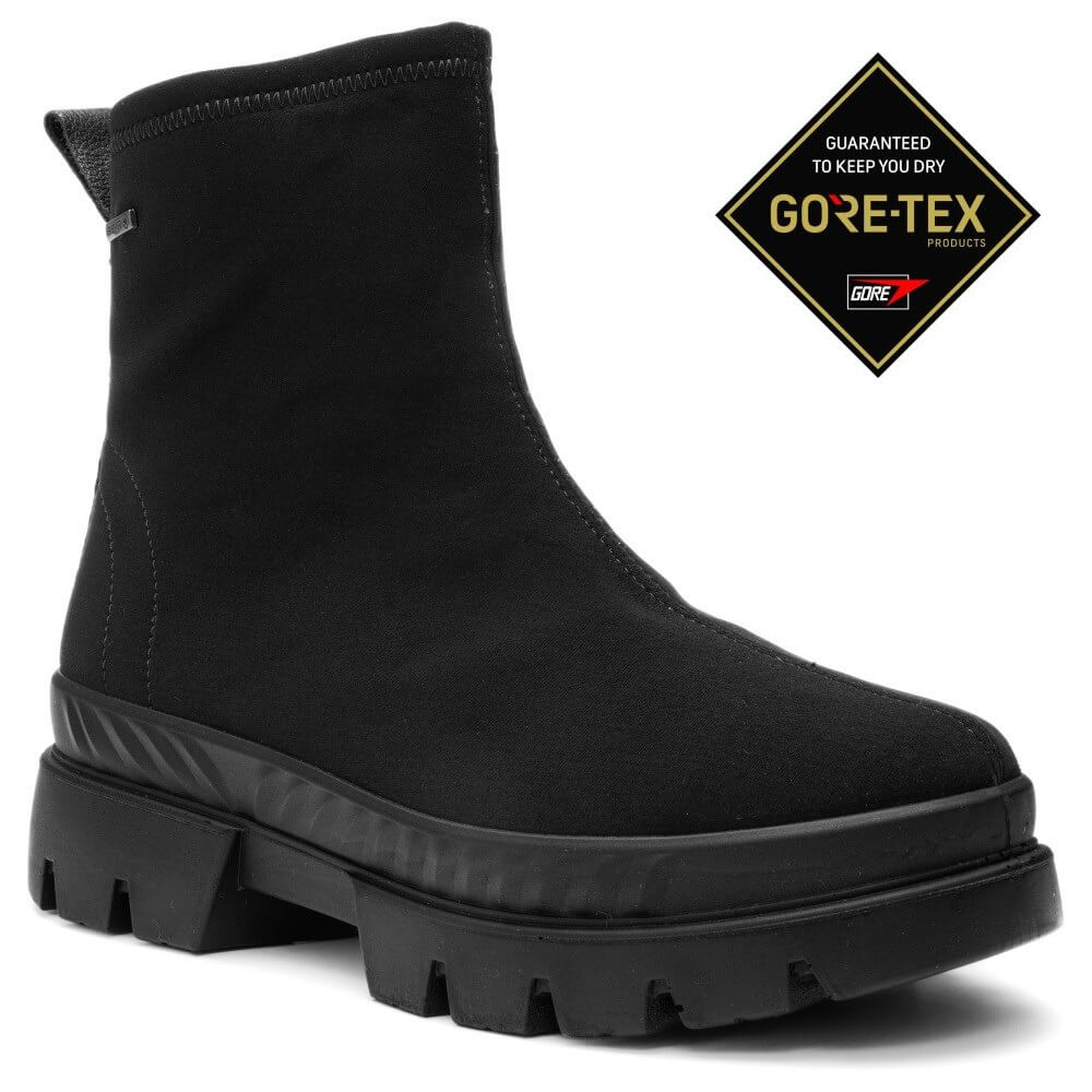 Ara black ankle boot with a rugged lug sole, shown in a side profile on a white background. A black diamond-shaped GORE-TEX guarantee badge is positioned in the upper right corner.