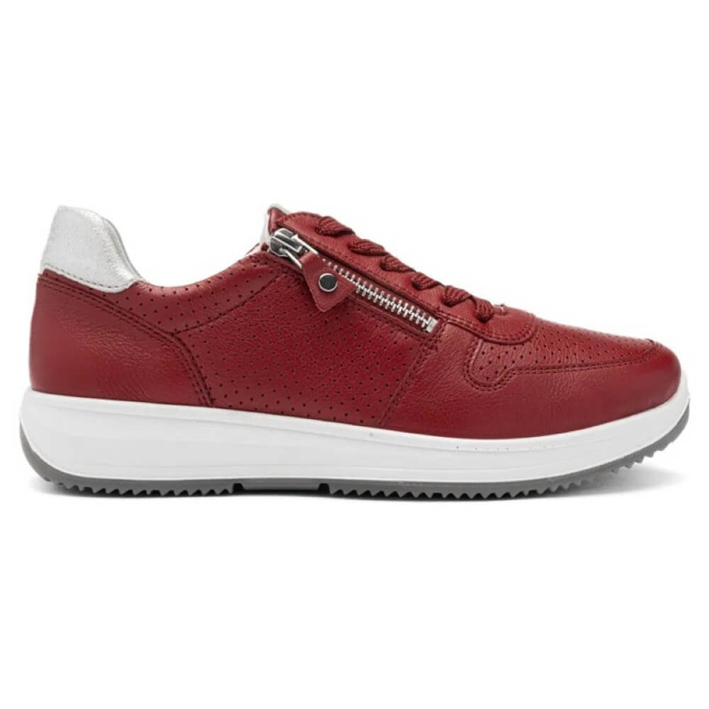 Red sneaker with a white sole on a white background