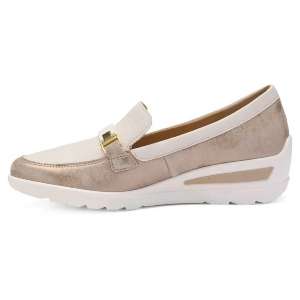 Beige and white loafer shoe on a white background