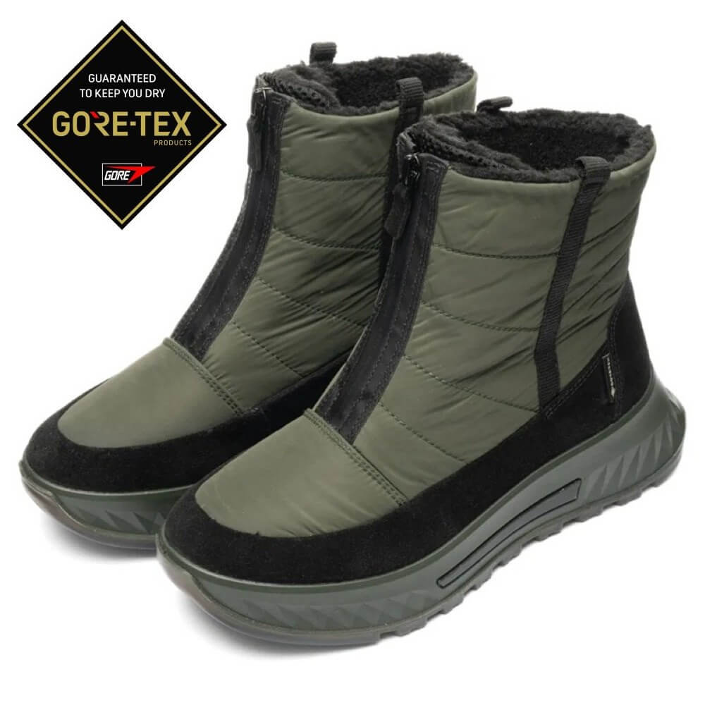 Pair of green and black winter boots with Gore-Tex logo on a white background