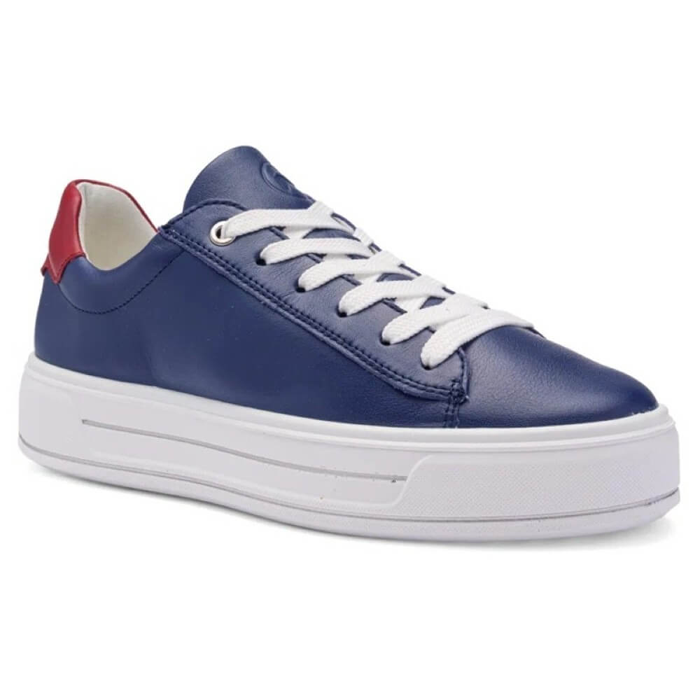 Blue sneaker with white sole and red heel on a white background