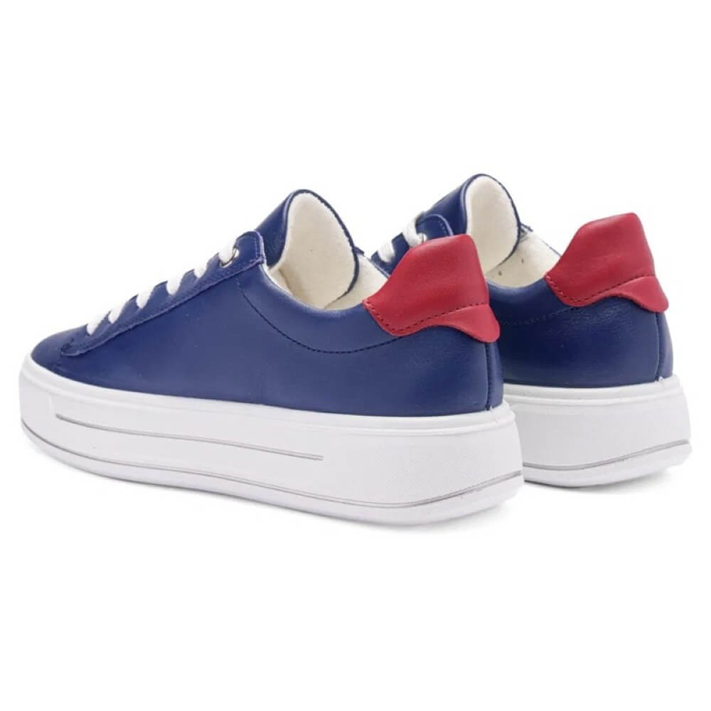 Blue sneakers with red accents on a white background
