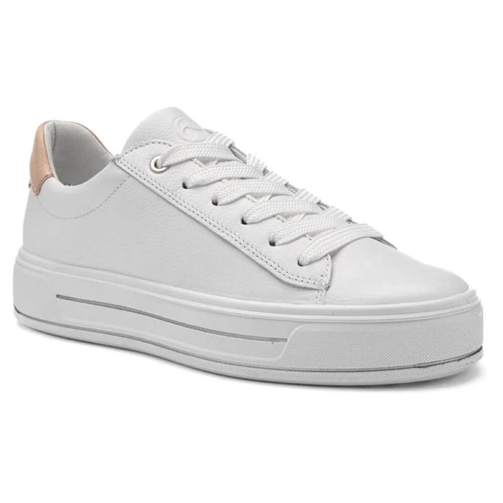 White sneaker with a thick sole on a white background