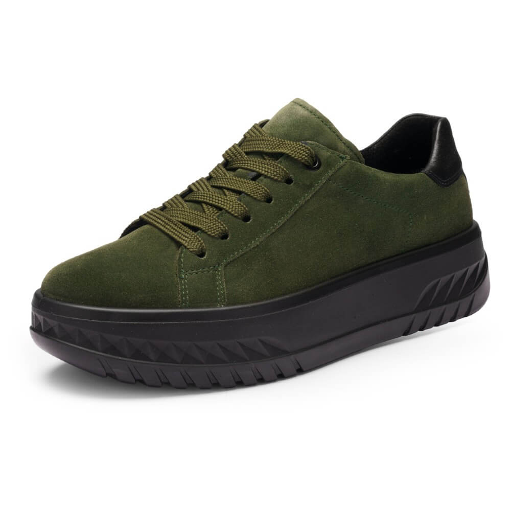 Green sneaker with black sole on a white background