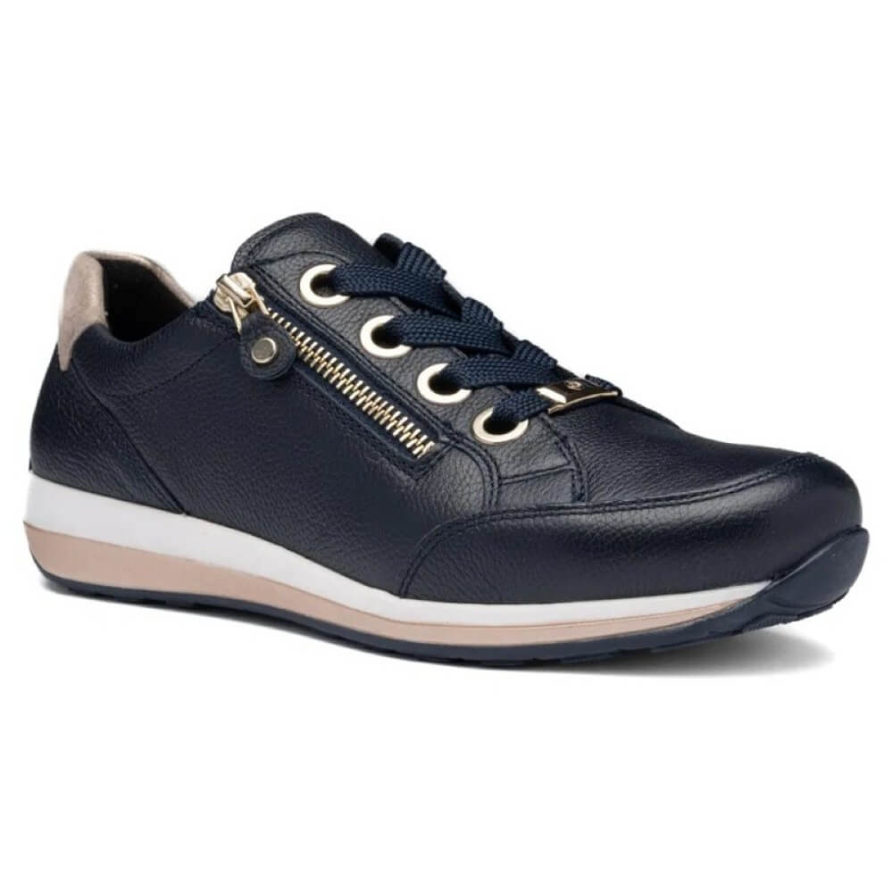 Navy blue sneaker with a white sole on a white background
