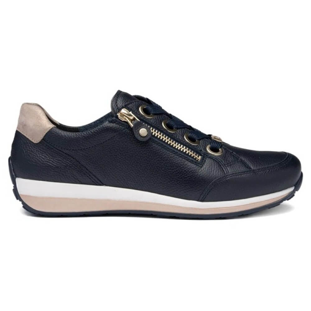Navy blue sneaker with gold zipper on a white background