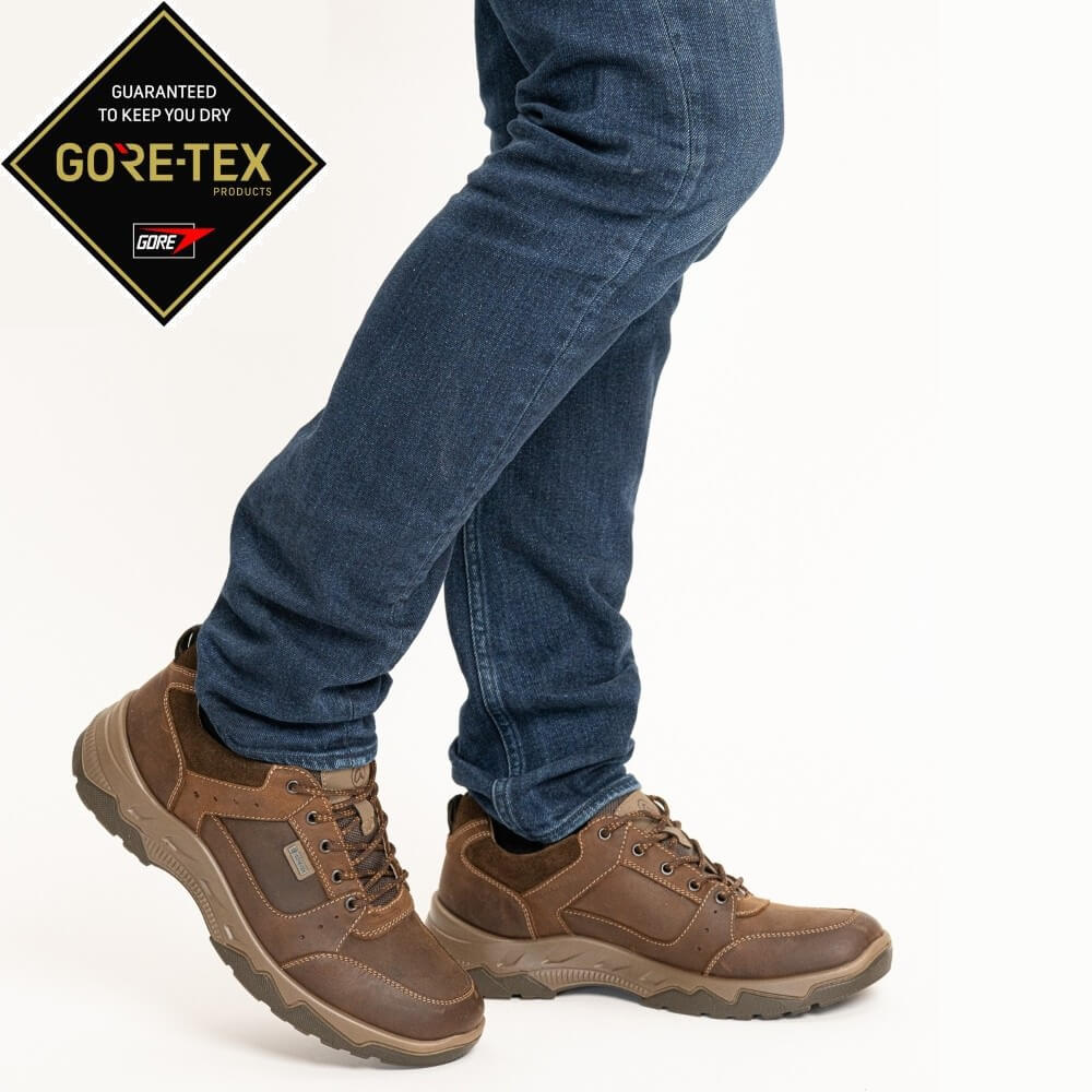 person wearing Brown Gore-Tex Waterproof walking shoes