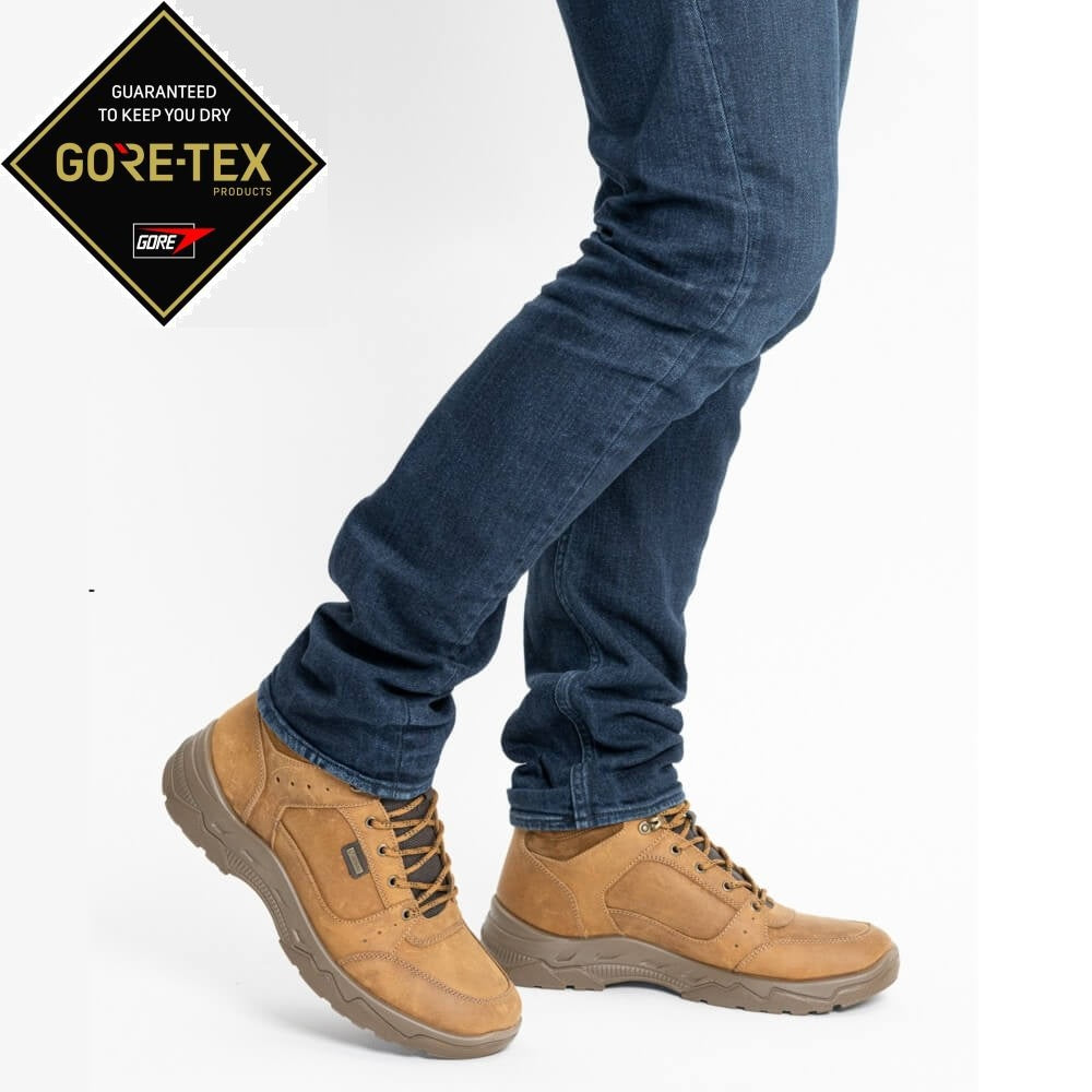  Person wearing Gore-Tex men's brown boot