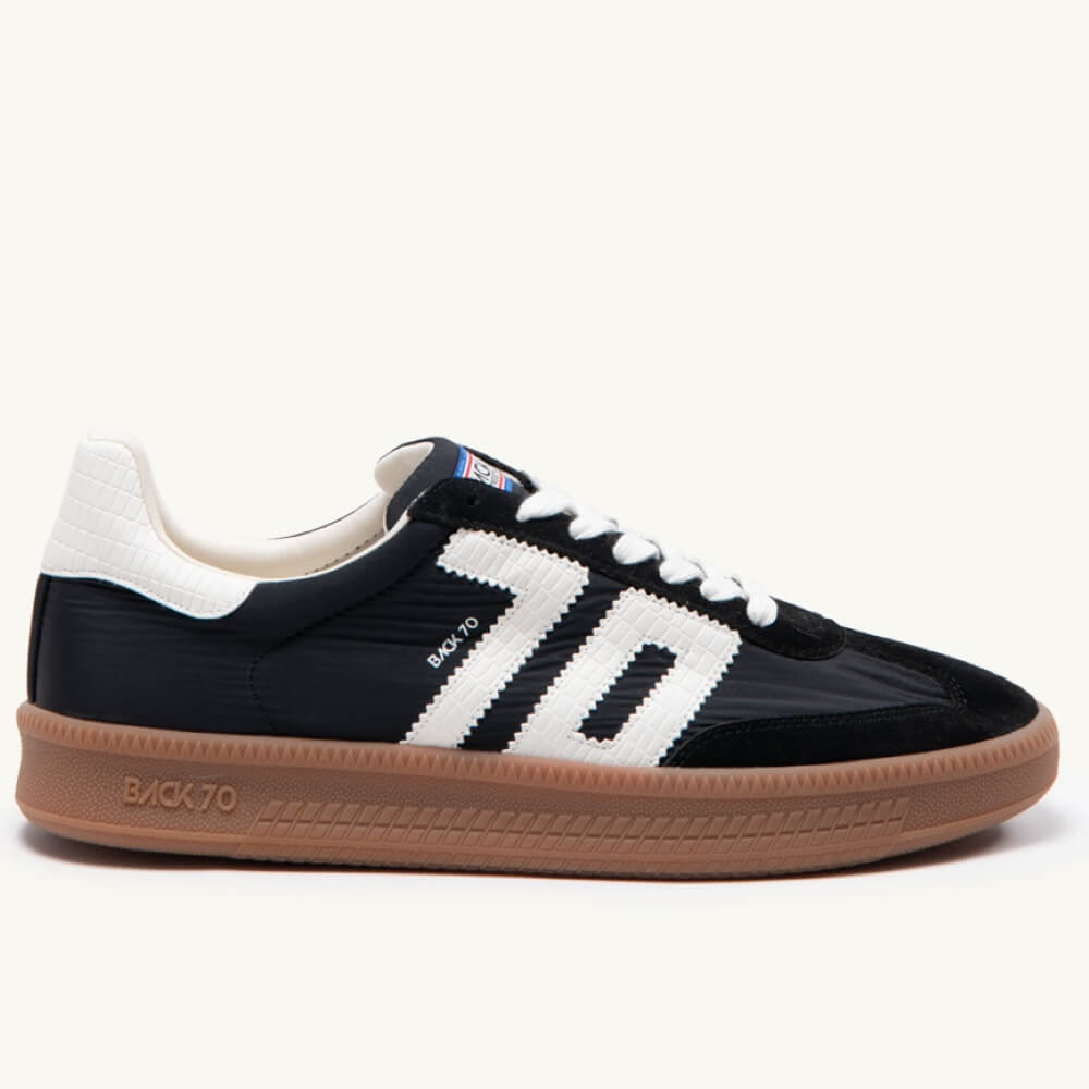 Back 70 Gents Black and white sneaker with brown sole on a white background
