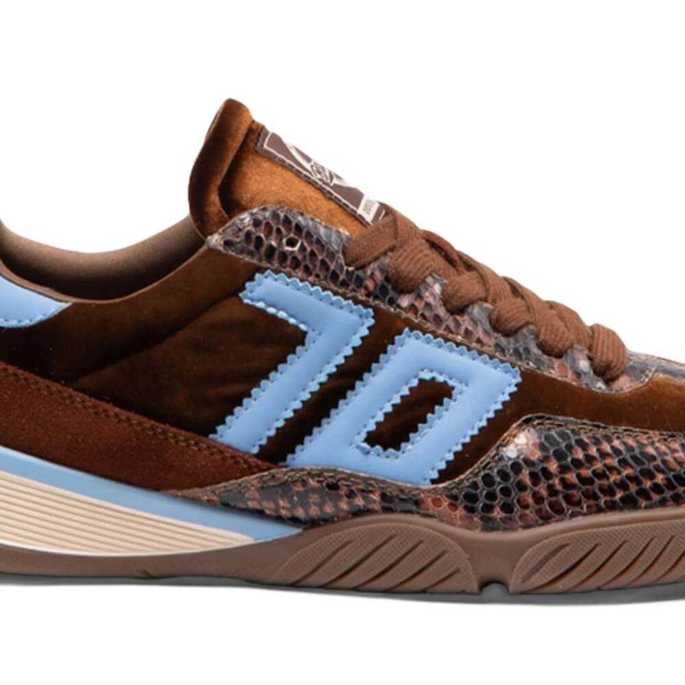 A Back 70 low-top sneaker featuring a mix of brown velvet, brown snakeskin-patterned leather, and light blue accents on the side stripes and heel tab, with a beige and brown midsole.
