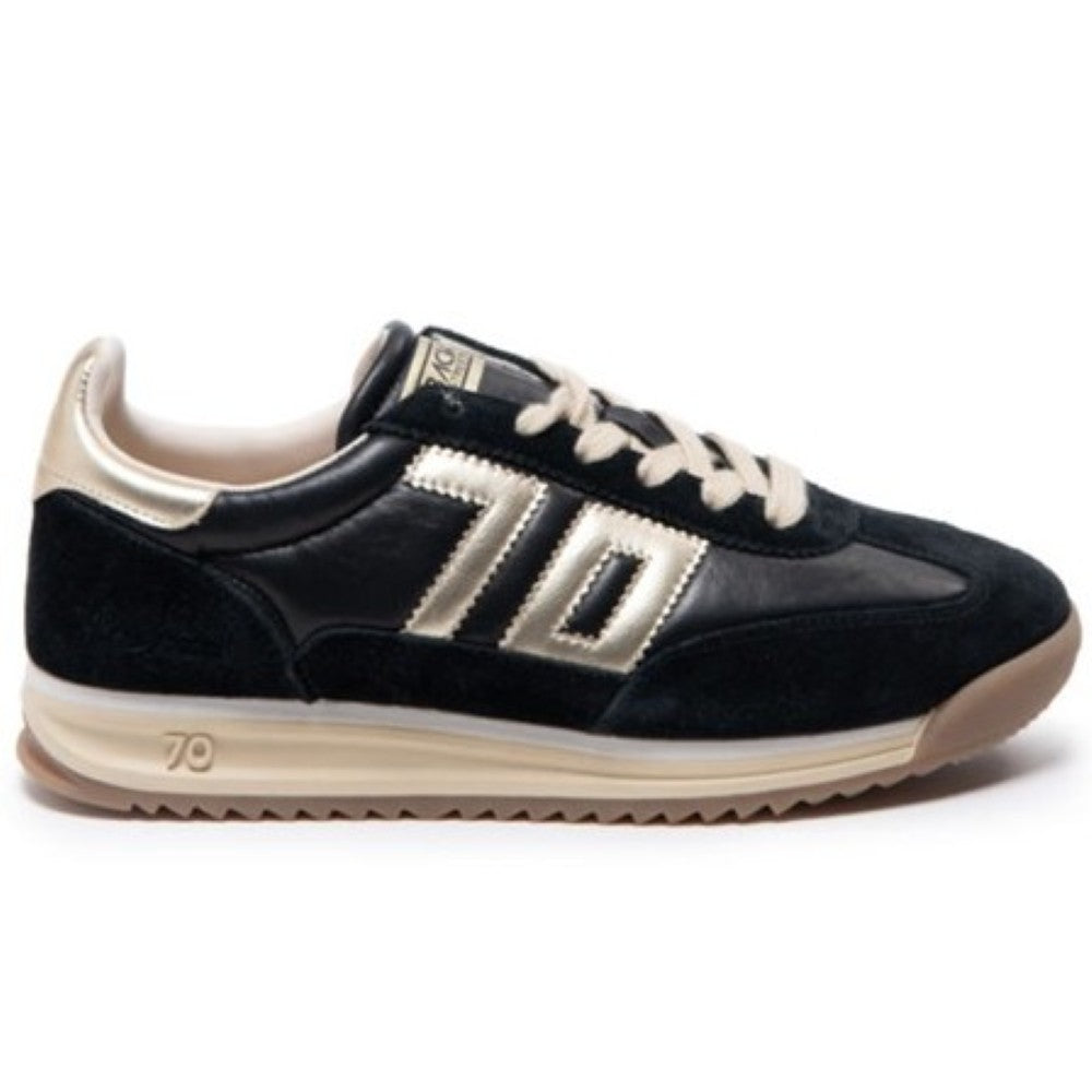 A Back 70 black and beige low-top sneaker with a suede and leather upper, featuring a large metallic beige '70' logo on the side, beige laces, and a beige midsole with a gum outsole.