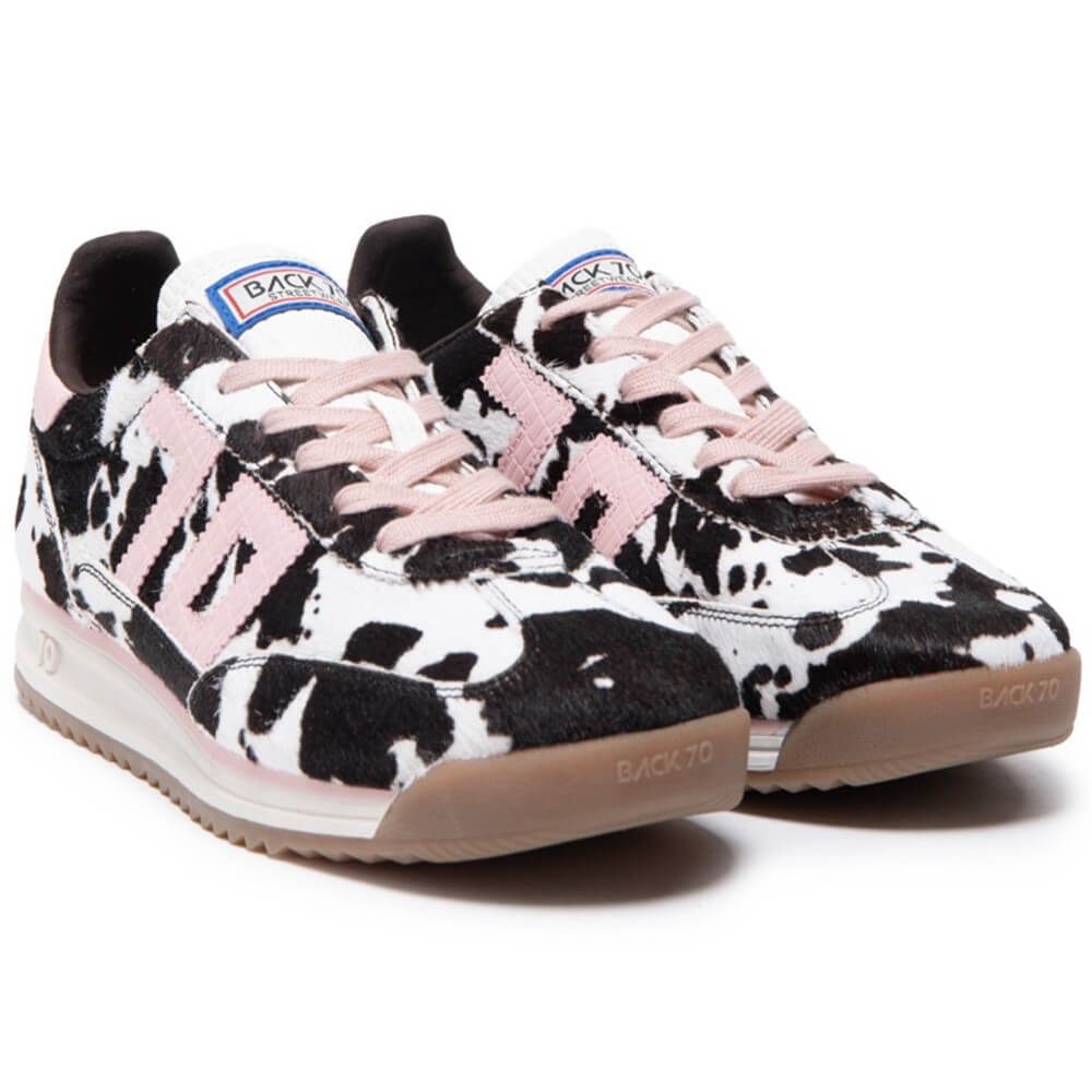 Sneaker with cow print pattern on a white background Back 70 Jogger Cow Pink L51 Crafted from soft pony hair leather in a striking cow print