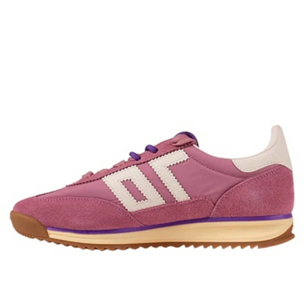 Back 70 Pink sneaker with white accents on a white background