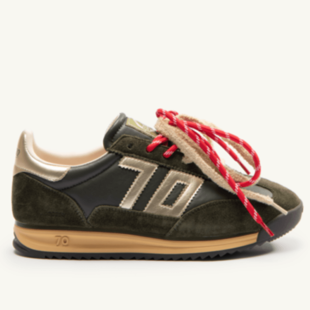A Back 70 low-top sneaker in dark olive green suede and black leather, featuring a beige '70' logo on the side, a tan midsole, and distinctive red-and-white braided laces.