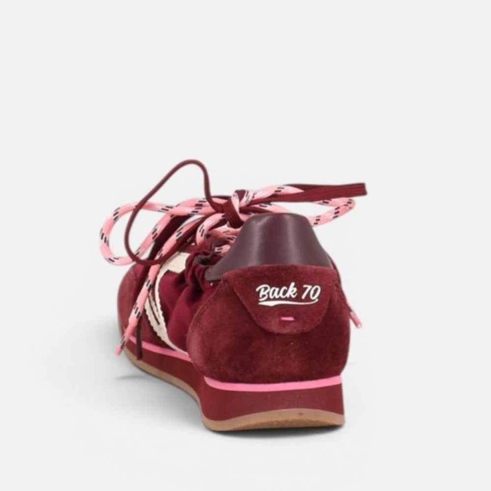A single Back 70 burgundy suede sneaker shown from the back, featuring pink and white patterned laces, a pink stripe along the midsole, and 'Back 70' embroidered on the heel.