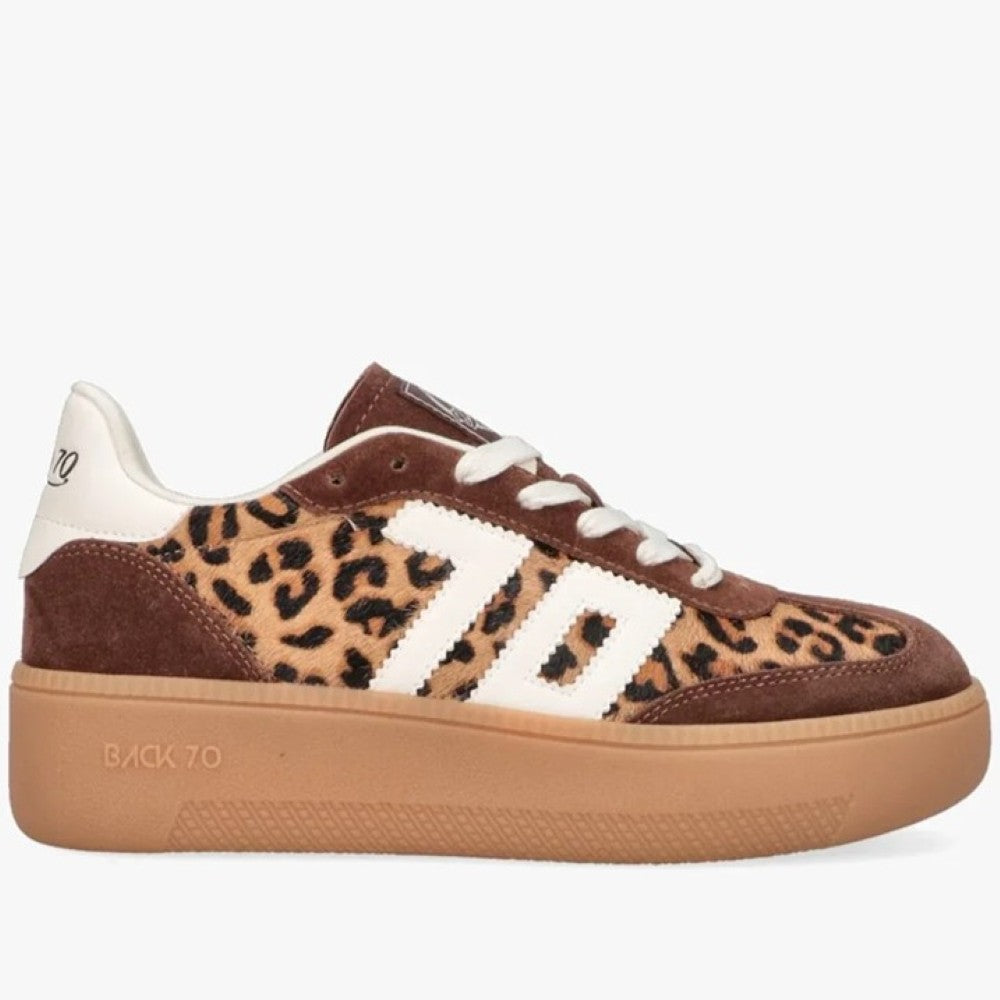 A low-top platform sneaker featuring a brown suede and leopard-print canvas upper, white side stripes, white laces, and a thick tan gum sole. The text 'BACK 70' is embossed on the side of the sole.