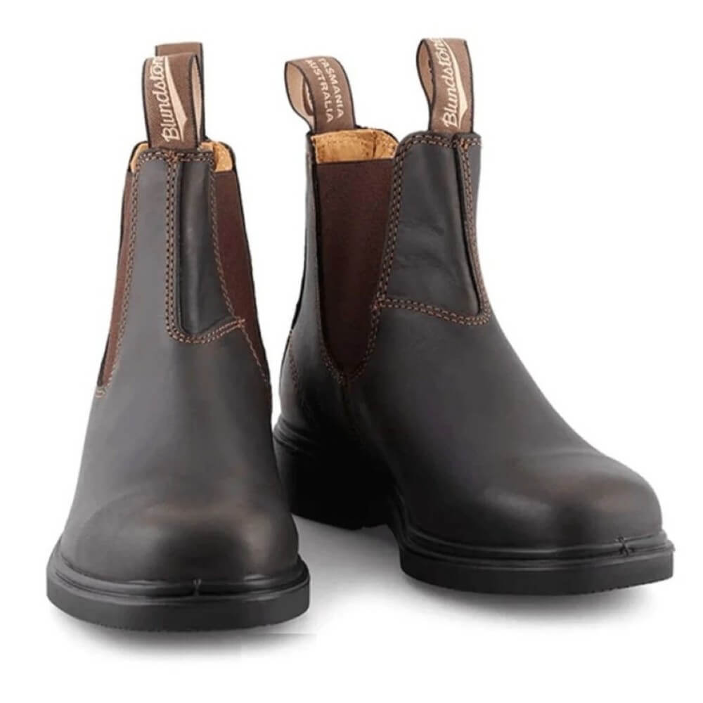 Pair of brown leather boots with a visible brand logo on a white background