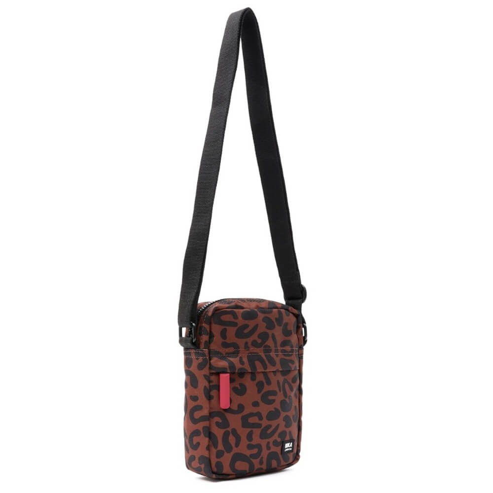 Crossbody bag with leopard print pattern on a white background