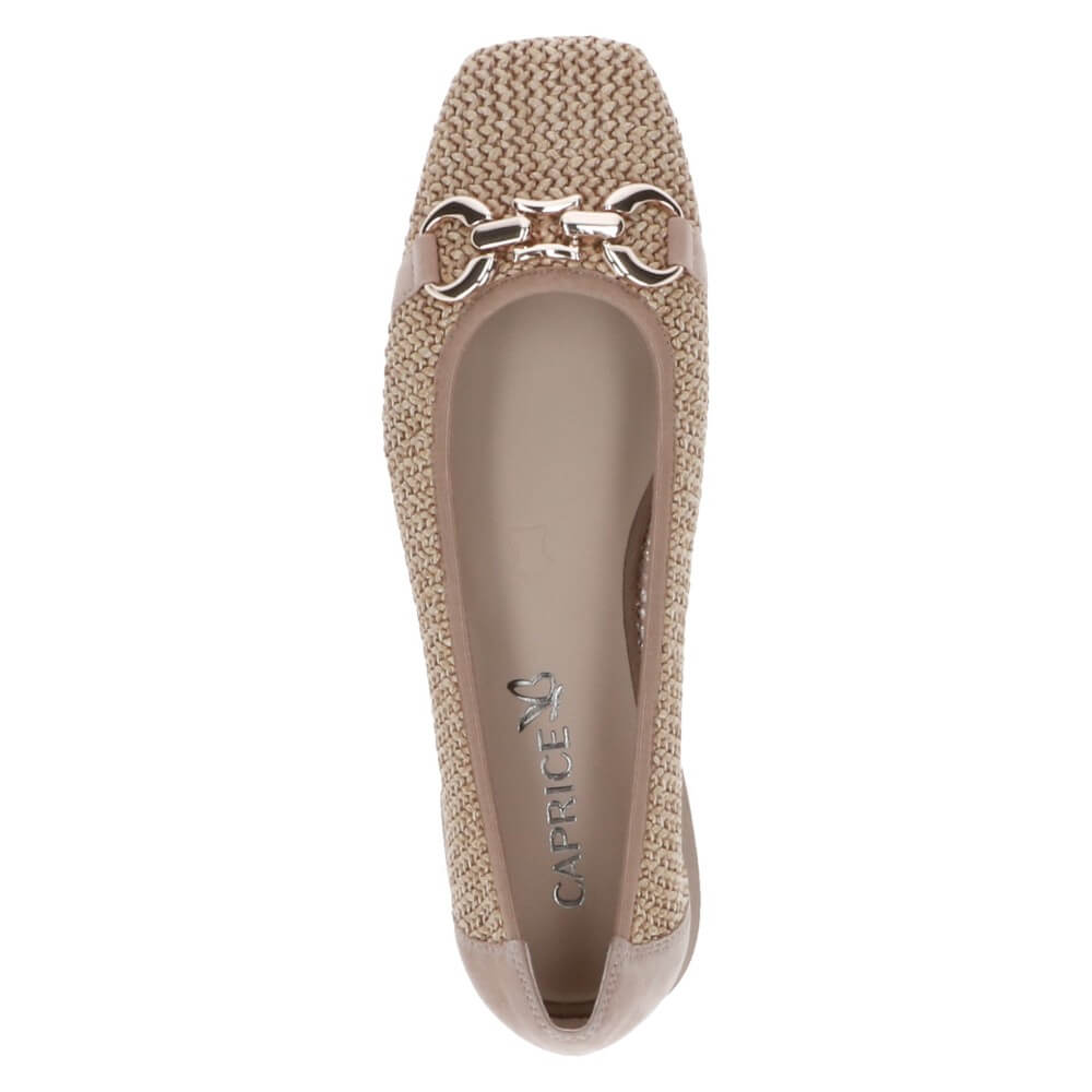 Caprice Beige woven flats worn with Blue jeans on a white background