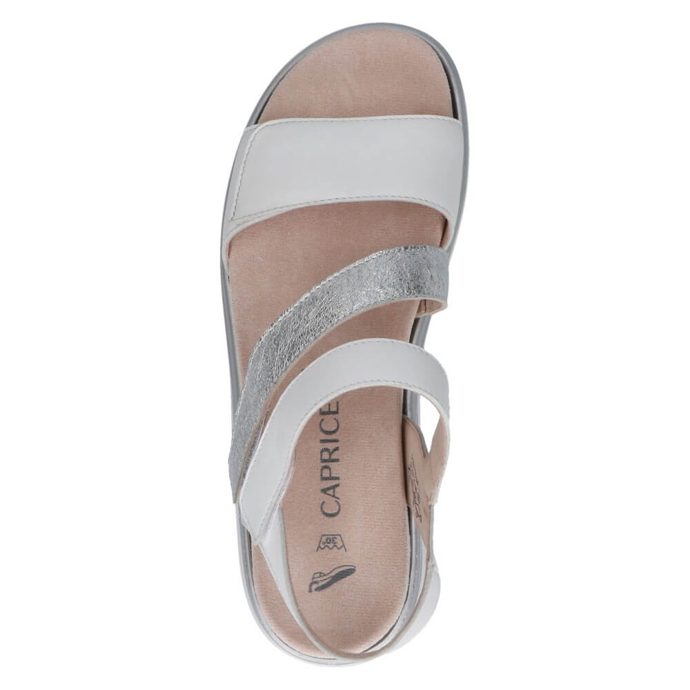 Caprice White sandal with a silver strap on a white background