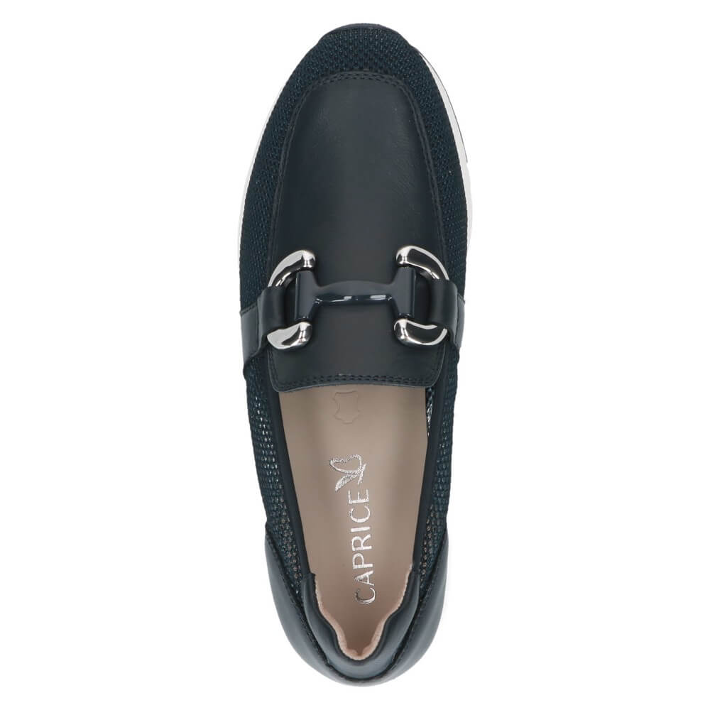 Navy loafer with silver buckle on a white background