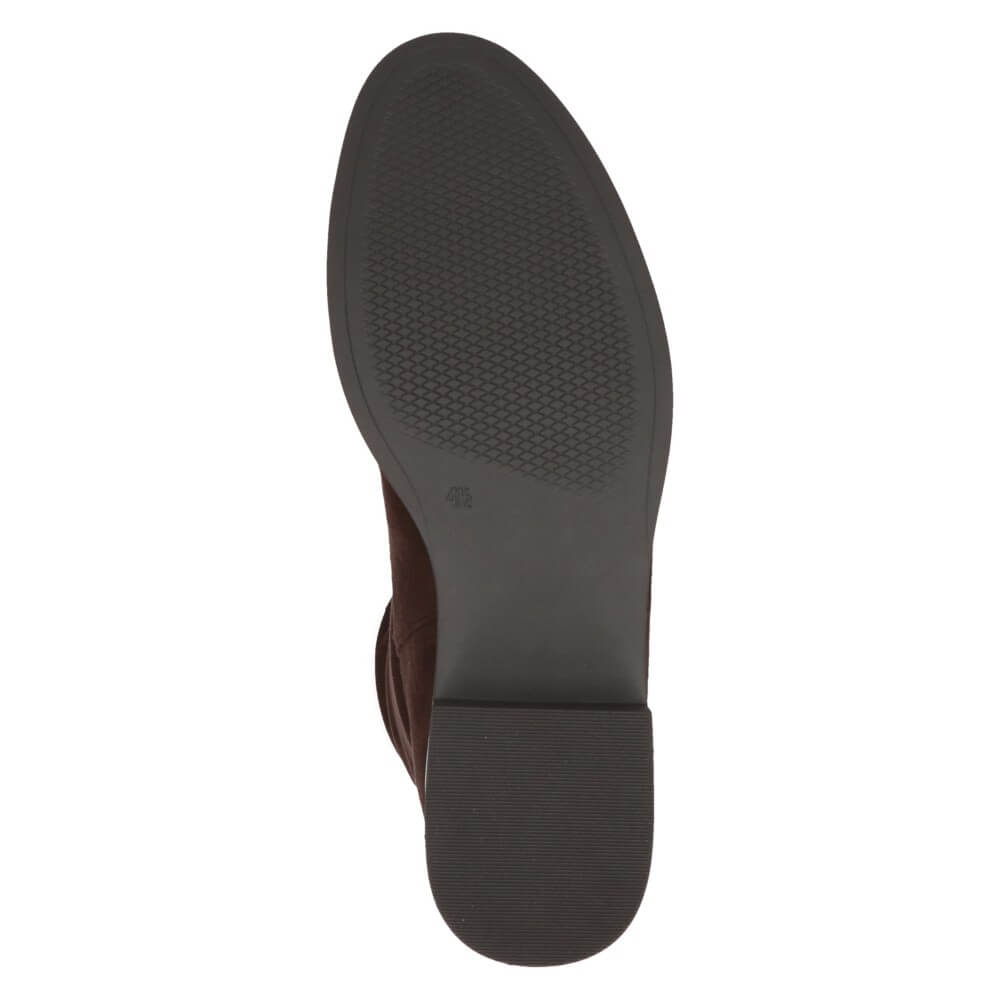 Close-up of a brown shoe sole on a white background