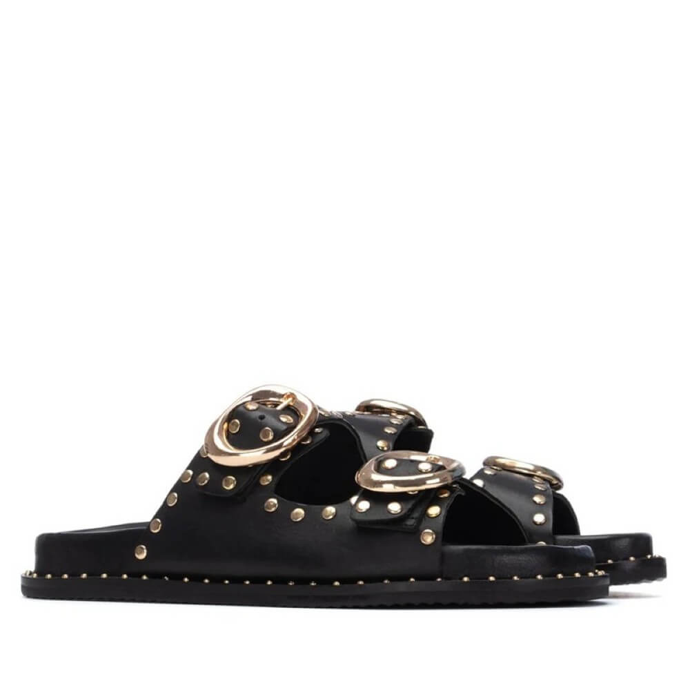 Carmela Black sandal with gold embellishments on a white background
