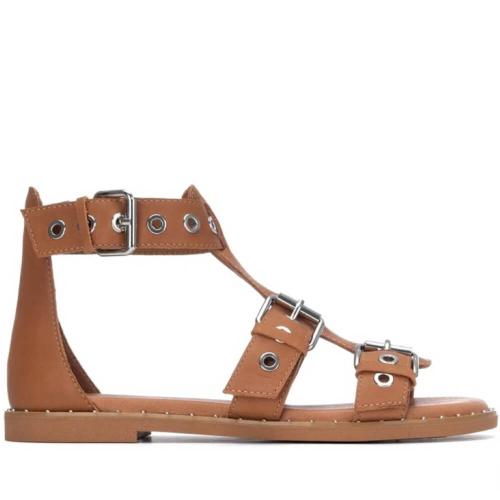 Carmela Brown Leather Gladiator  sandal with metal straps on a white background