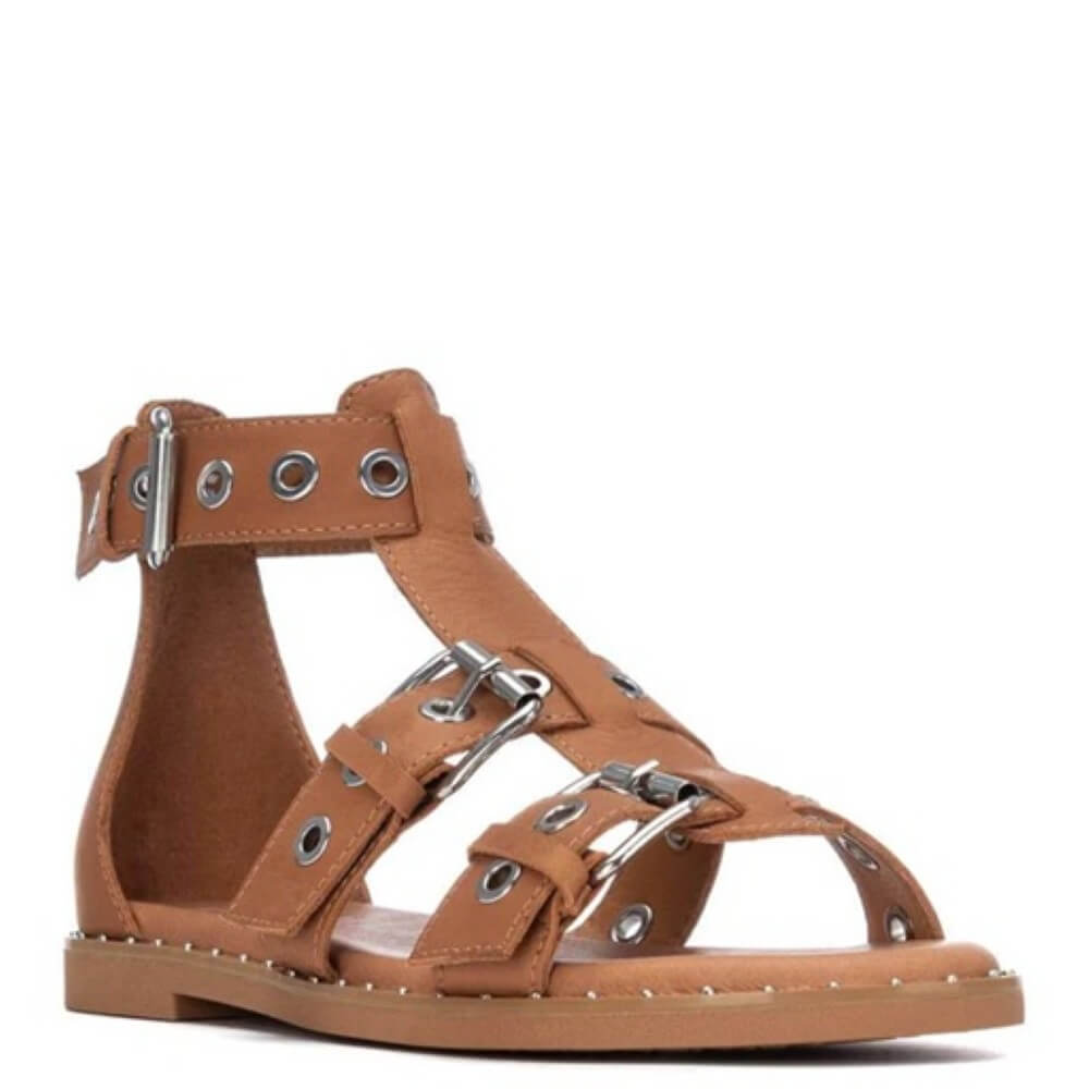 Carmela Brown Leather Gladiator  sandal with metal straps on a white background