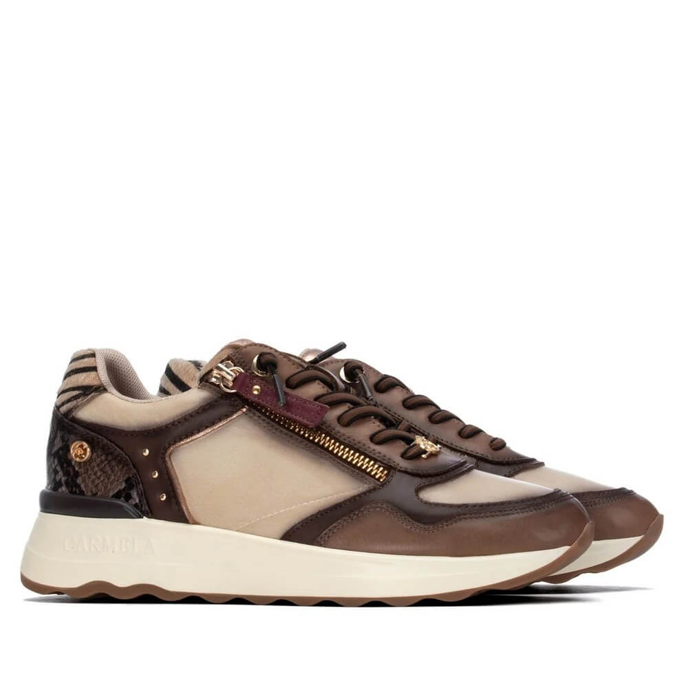 A pair of low-top sneakers in brown and beige leather with a gold-tone zipper, brown laces, and a cream-colored midsole, shown against a plain white background.
