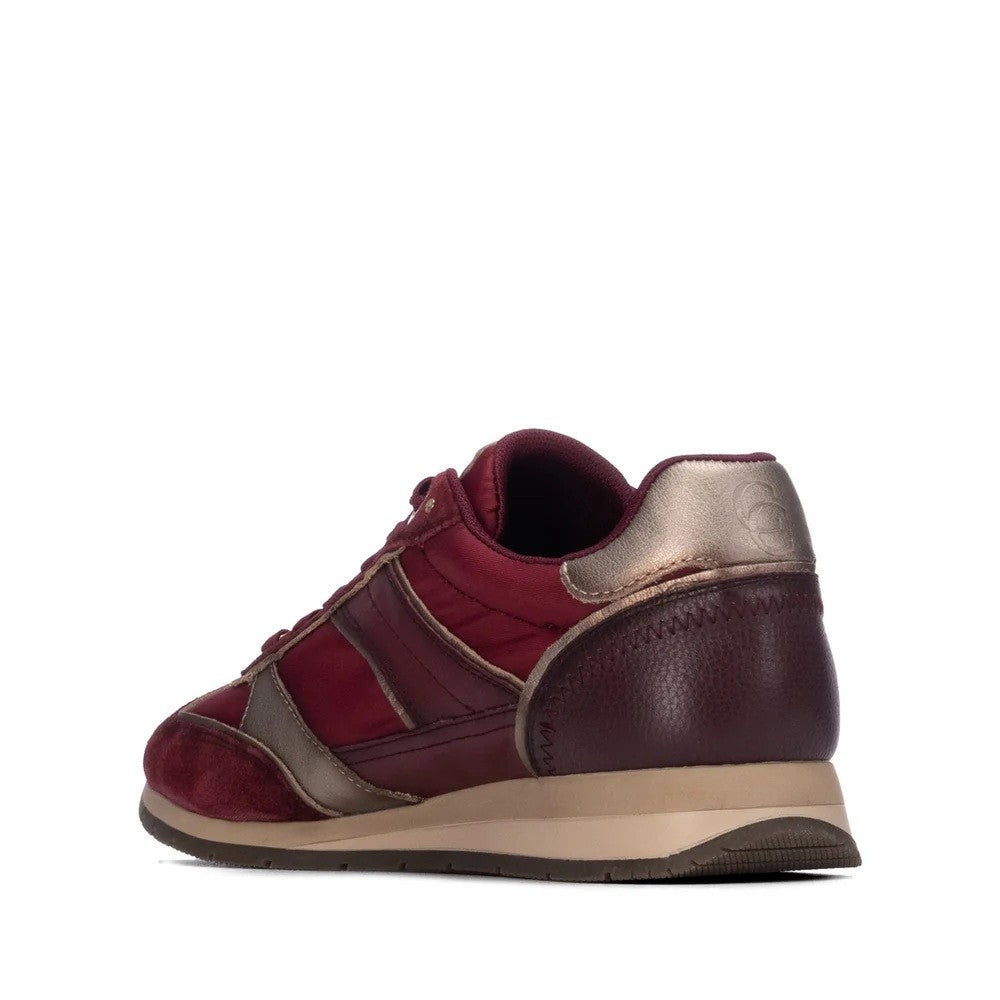 A low-top sneaker shown from the side profile on a white background. The shoe features burgundy leather and suede panels, metallic rose gold leather overlays, a beige midsole, and a dark brown outsole.