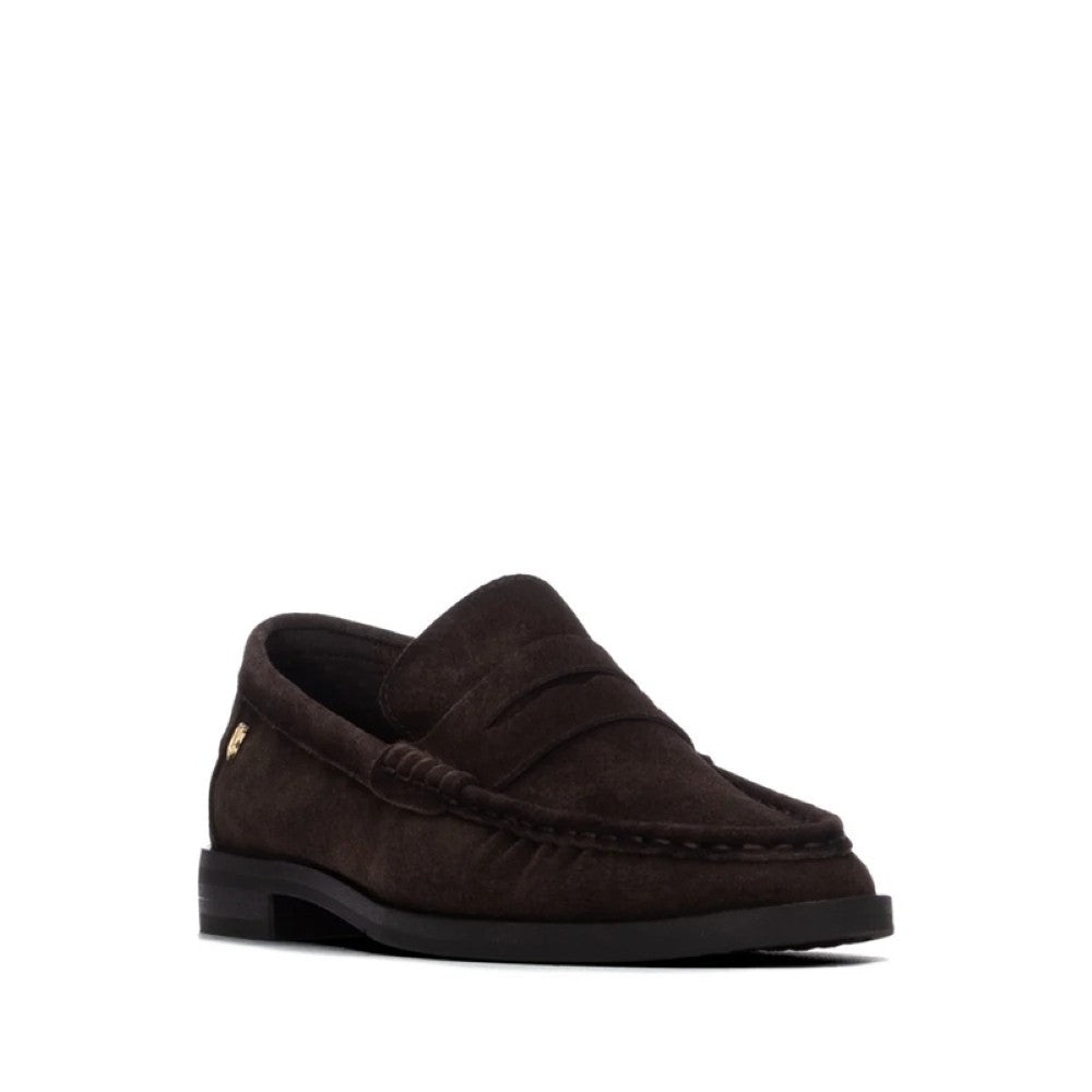 A Carmela dark brown suede penny loafer shown in a side front profile view against a solid white background.