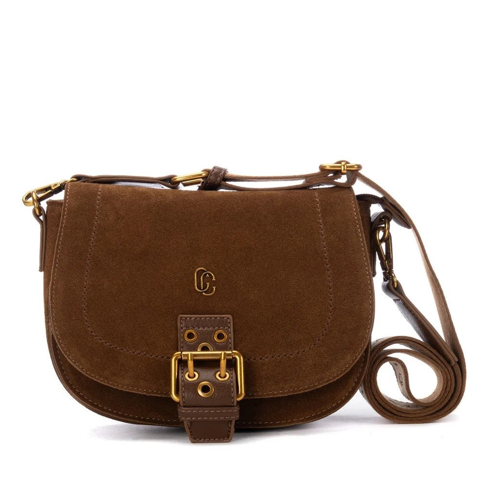A Carmela brown suede crossbody bag with a gold-tone buckle and a small interlocking 'C' logo on the front, displayed on a clean white background.