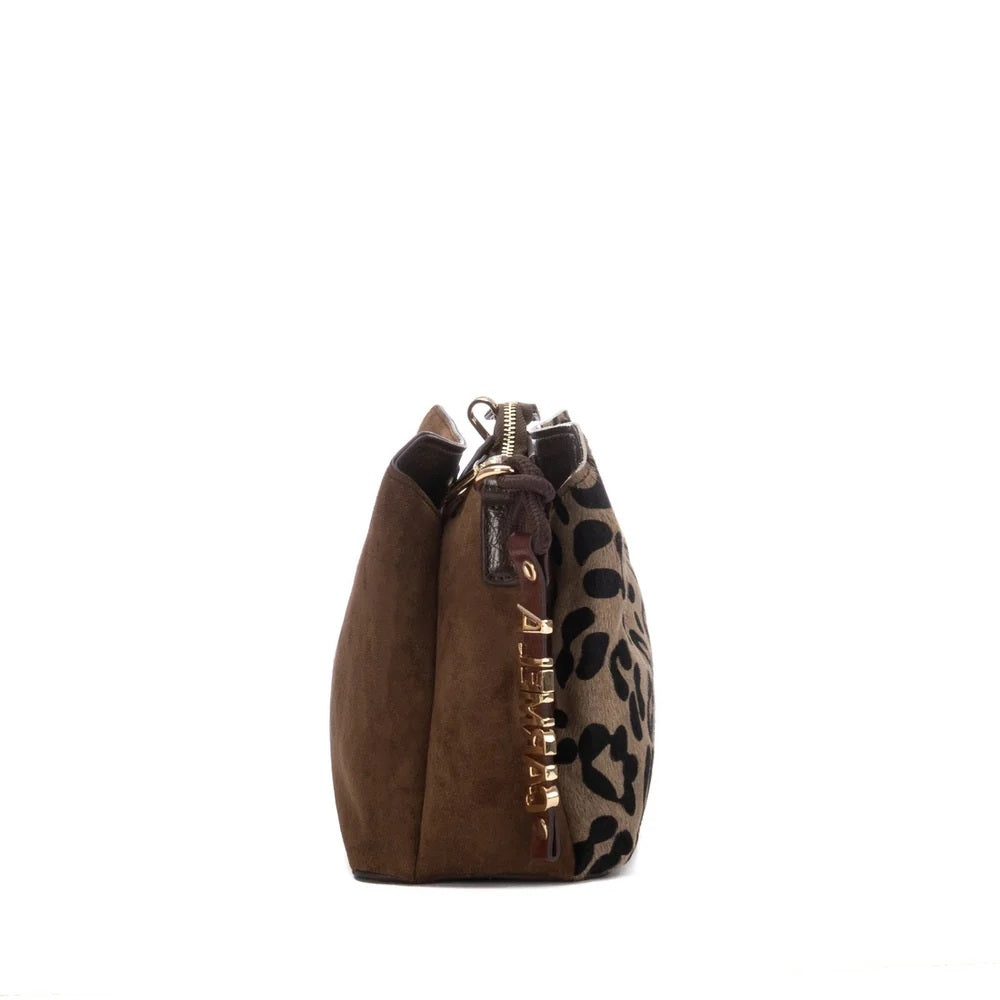 A Carmela brown suede shoulder bag with a leopard print side panel, gold-tone hardware, and a small black brand tag, shown against a plain white background.