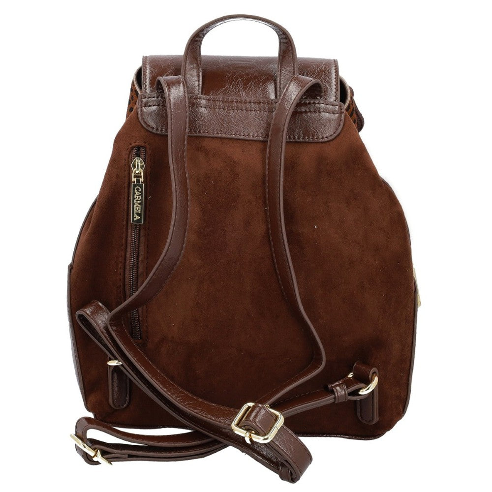 A Carmela brown suede and leather effect backpack with a top handle, a detachable shoulder strap, and a vertical zippered pocket on the side, shown against a plain white background.