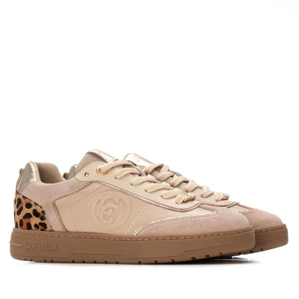 Beige sneaker with leopard print accent on a white background