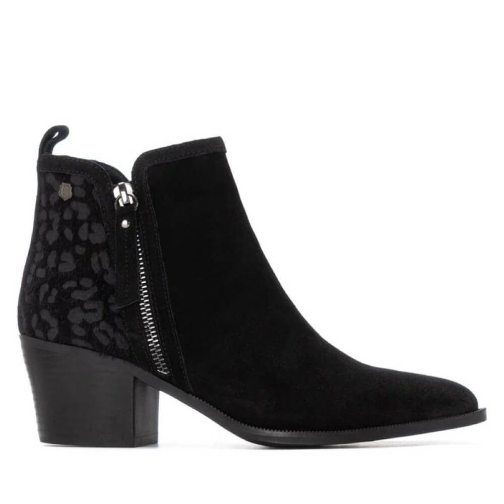 Black ankle boots with leopard print side panel on a white background