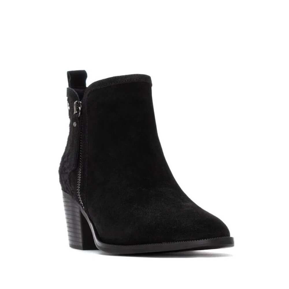 Black ankle boot with a block heel on a white background