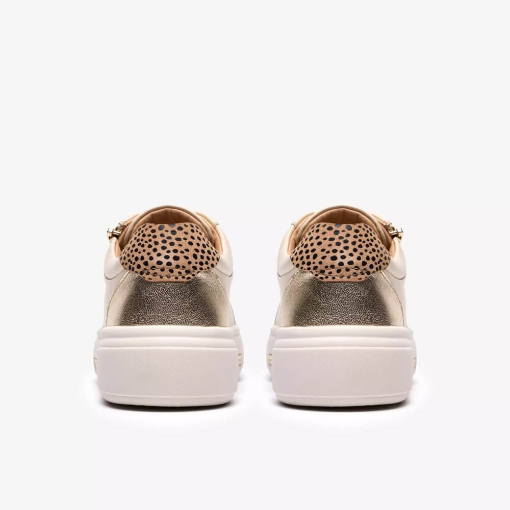 Clarks Cream Leather sneaker with leopard print details on a white background