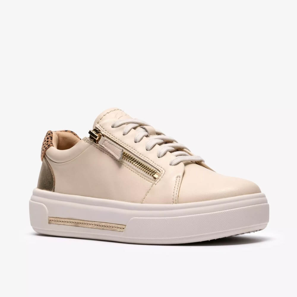 Clarks Cream Leather sneaker with leopard print details on a white background