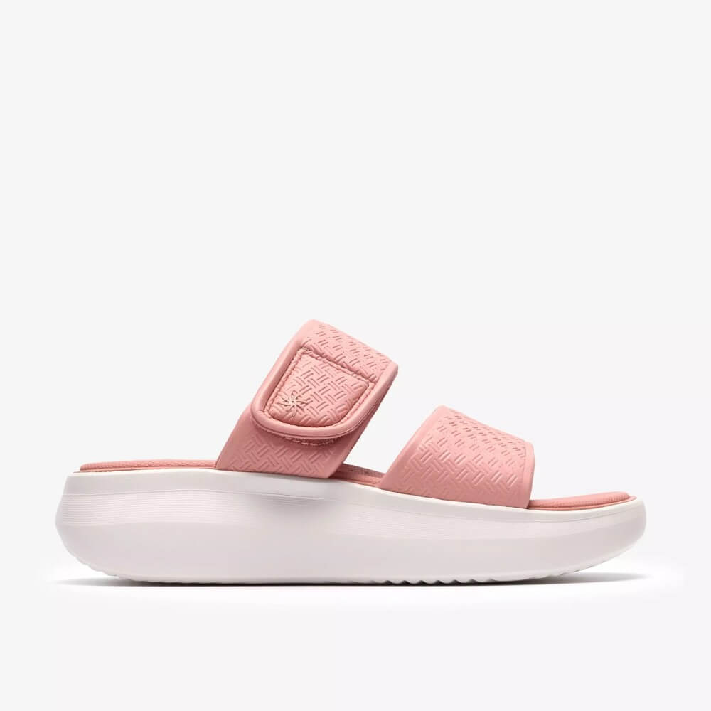  Clarks Pink slide sandal with white sole on a light Grey background