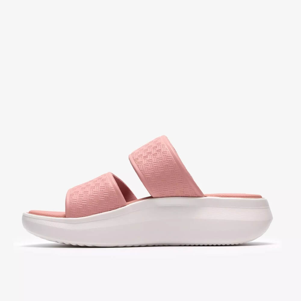  Clarks Pink slide sandal with white sole on a light Grey background