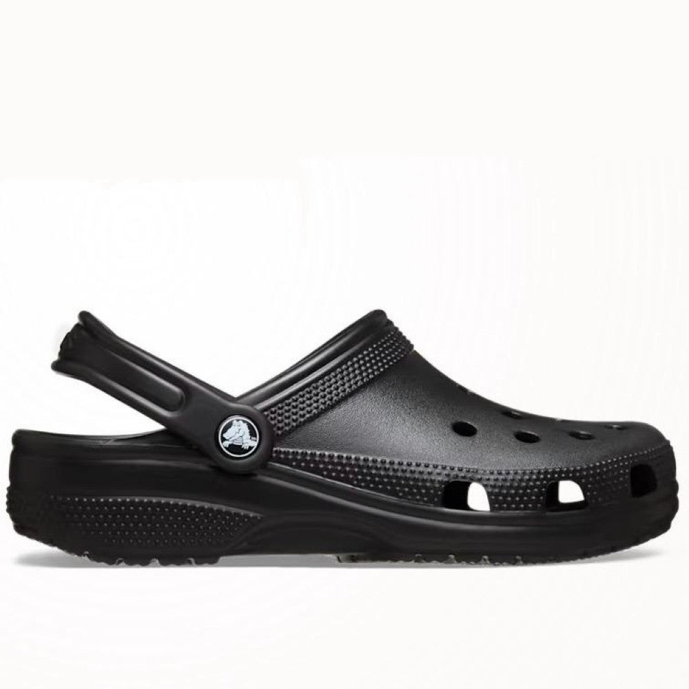 Black Crocs clog shoe on a white background