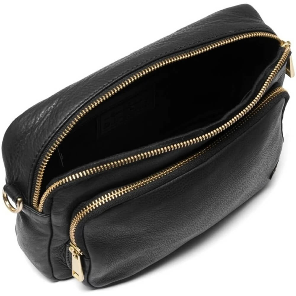 Depeche Black leather crossbody bag with gold accents on a white background